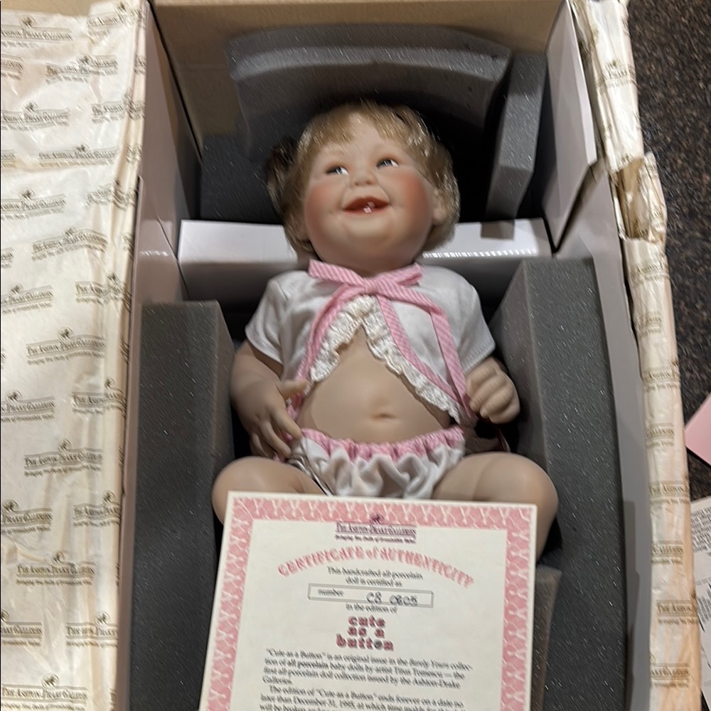 Smiling Baby Doll with Pink and White Outfit  #